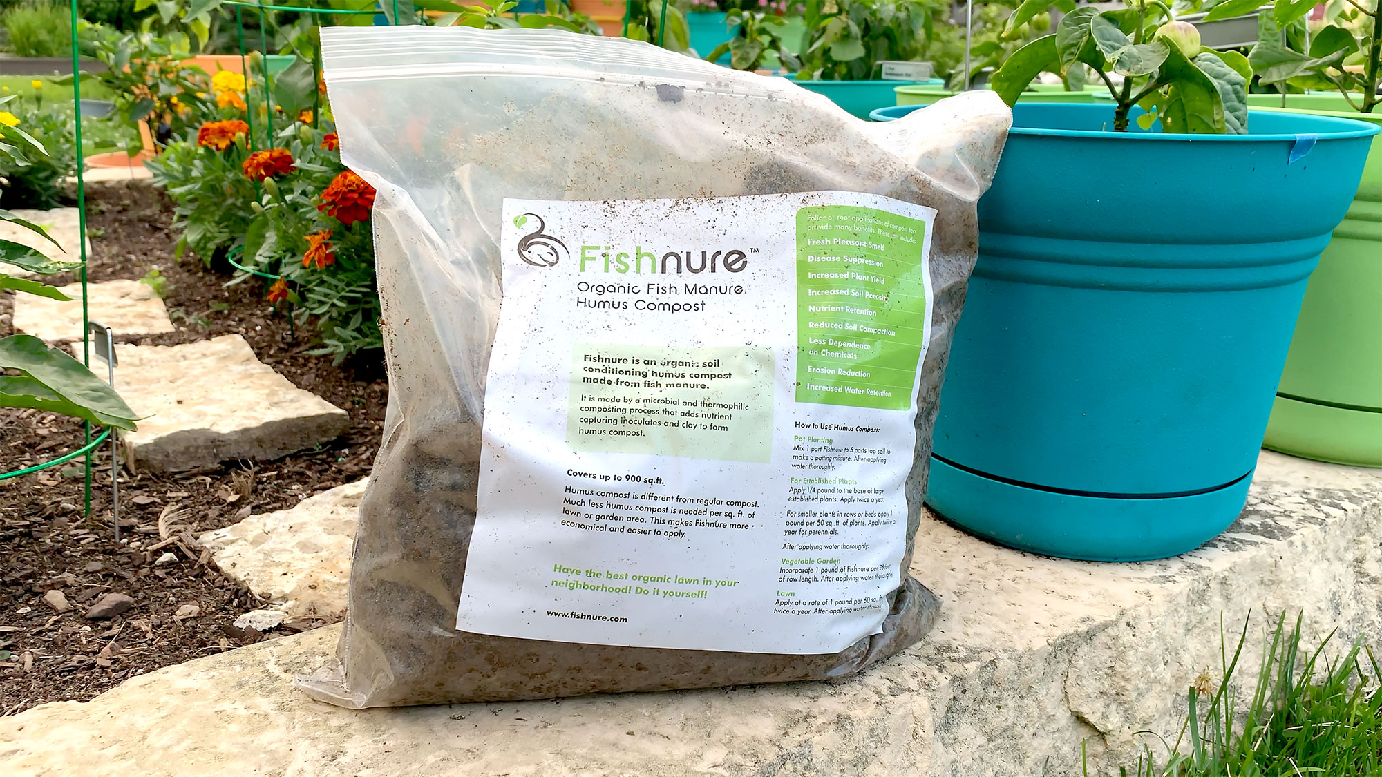 A bag of Fishnure sitting outdoors in the garden